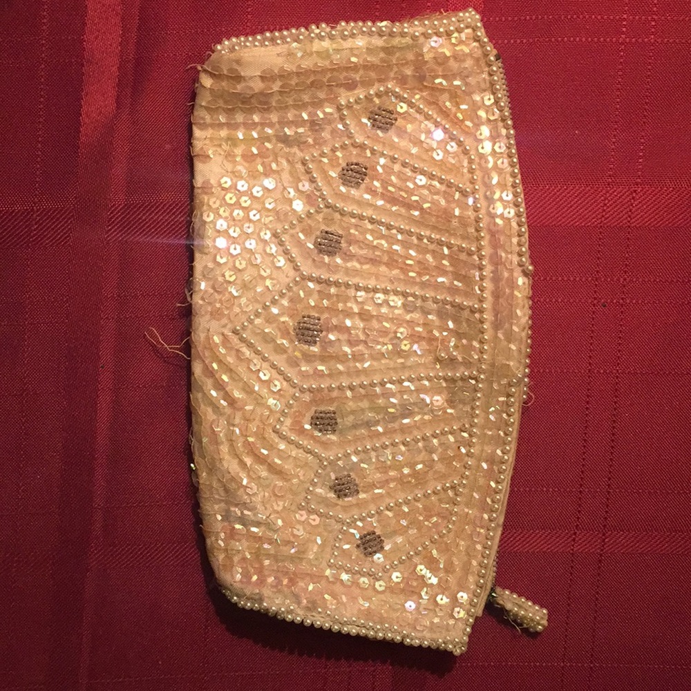 Cream beaded clutch